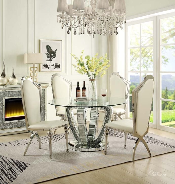 The appearance of Acme Noralie Dining Table In Mirrored and Faux Diamonds DN00717 designed by ACME in the glam interior design. This mirrored piece of furniture  was selected by 1StopBedrooms from Noralie Collection to add a touch of cosiness and style into your home. Sku: DN00717-1;DN00717-2. Table Base Style: Pedestal. Table Top Shape: Round. Material: Wood. Product Type: Dining Table. Image1