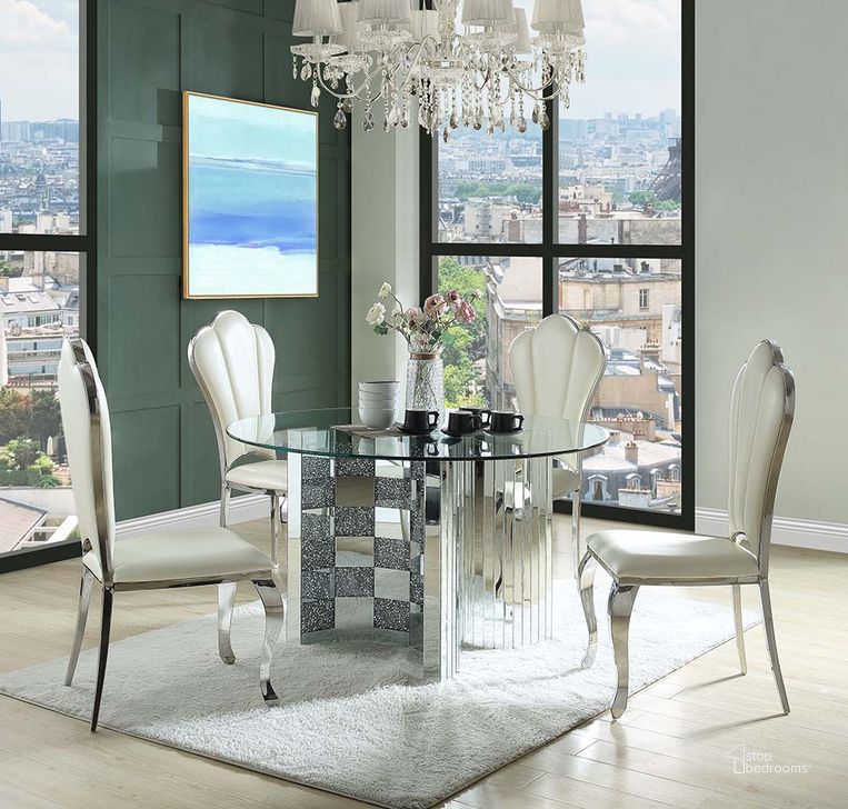The appearance of Acme Noralie Dining Table In Mirrored and Faux Diamonds DN00718 designed by ACME in the glam interior design. This mirrored piece of furniture  was selected by 1StopBedrooms from Noralie Collection to add a touch of cosiness and style into your home. Sku: DN00718-1;DN00718-2. Table Base Style: Pedestal. Table Top Shape: Round. Material: Wood. Product Type: Dining Table. Image1