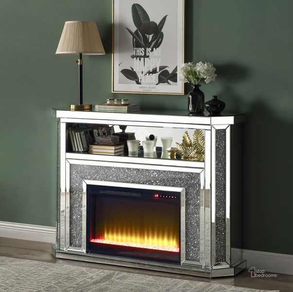 The appearance of Acme Noralie Fireplace With Led In Mirrored And Faux Diamonds AC00508 designed by ACME in the glam interior design. This mirrored piece of furniture  was selected by 1StopBedrooms from Noralie Collection to add a touch of cosiness and style into your home. Sku: AC00508. Material: Wood. Product Type: Fireplace. Image1