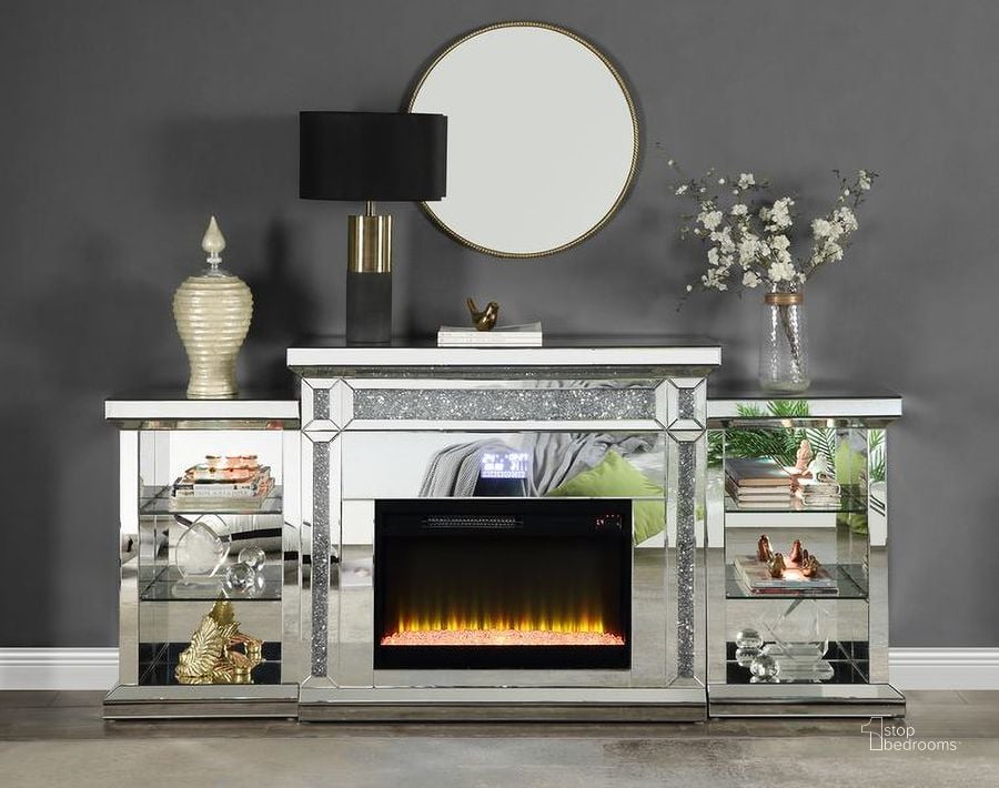 The appearance of Acme Noralie Fireplace With Led In Mirrored And Faux Diamonds AC00518 designed by ACME in the glam interior design. This mirrored piece of furniture  was selected by 1StopBedrooms from Noralie Collection to add a touch of cosiness and style into your home. Sku: AC00518-1;AC00518-2;AC00518-3. Material: Wood. Product Type: Fireplace. Image1