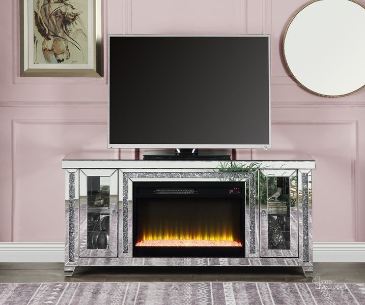 The appearance of Acme Noralie TV Stand With Fireplace In Mirrored And Faux Diamonds LV00315 designed by ACME in the glam interior design. This mirrored piece of furniture  was selected by 1StopBedrooms from Noralie Collection to add a touch of cosiness and style into your home. Sku: LV00315. Material: Wood. Product Type: TV Stand.