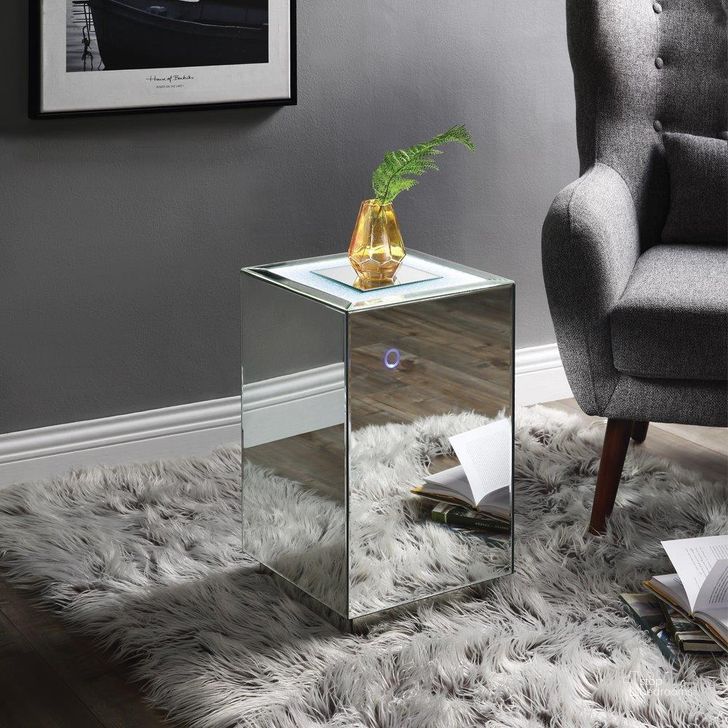 The appearance of Acme Nyoka Accent Table With Led In Mirrored And Faux Gems designed by ACME in the glam interior design. This mirrored piece of furniture  was selected by 1StopBedrooms from Nowles Collection to add a touch of cosiness and style into your home. Sku: 97704. Product Type: Accent Table. Material: MDF. Image1