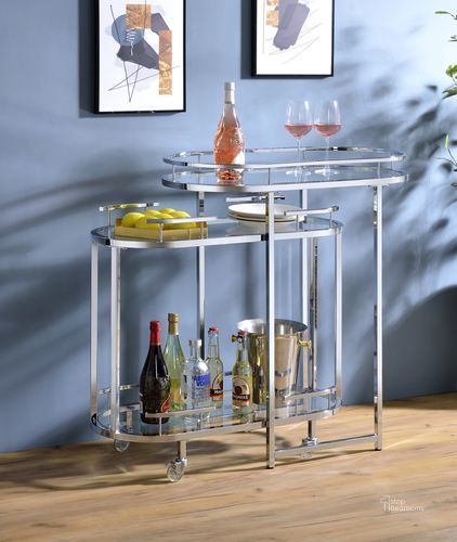 The appearance of Acme Piffo Serving Cart and Bar Table In Clear Glass and Chrome Finish designed by ACME in the modern / contemporary interior design. This chrome piece of furniture  was selected by 1StopBedrooms from Piffo Collection to add a touch of cosiness and style into your home. Sku: AC00162. Material: Metal. Product Type: Serving Cart. Image1