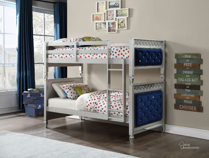 The appearance of Acme Varian Twin Over Twin Bunk Bed In Blue Velvet And Silver Finish designed by ACME in the modern / contemporary interior design. This blue piece of furniture  was selected by 1StopBedrooms from Varian Collection to add a touch of cosiness and style into your home. Sku: 38330TOP;38331BASE;38332RL. Bed Type: Bunk Bed. Material: Wood. Product Type: Bunk Bed. Bed Size: Twin Over Twin. Image1