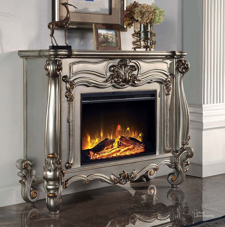 The appearance of Acme Versailles Fireplace In Antique Platinum Finish designed by ACME in the transitional interior design. This antique platinum piece of furniture  was selected by 1StopBedrooms from Versailles Collection to add a touch of cosiness and style into your home. Sku: AC01314. Material: Wood. Product Type: Fireplace.