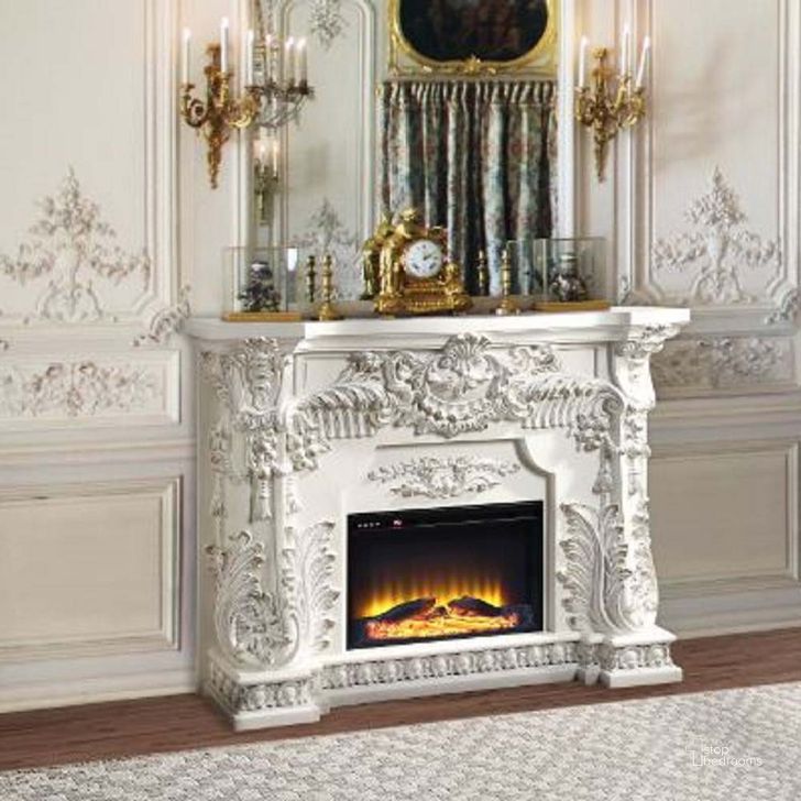 Sitting room with marble fireplace, pair of black leather button