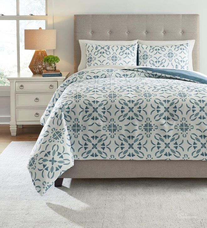 The appearance of Adason Blue And White King Size Comforter Set designed by Signature Design by Ashley in the modern / contemporary interior design. This blue/white piece of furniture  was selected by 1StopBedrooms from Adason Collection to add a touch of cosiness and style into your home. Sku: Q371003K. Material: Microfiber. Bed Size: King. Product Type: Comforter Set. Image1