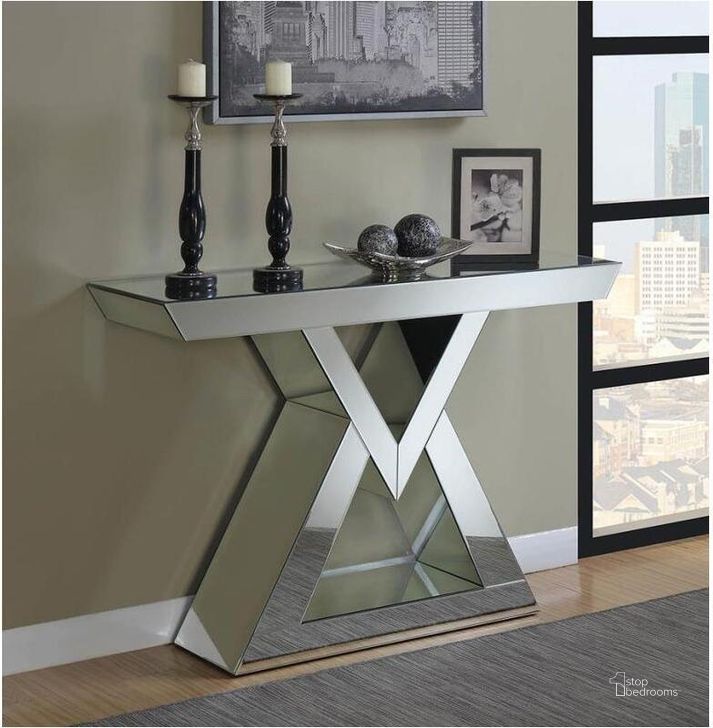 The appearance of Alcanoe Silver Console Table 0qd2316074 designed by Luxury Loft in the modern / contemporary interior design. This silver piece of furniture  was selected by 1StopBedrooms from Alcanoe Collection to add a touch of cosiness and style into your home. Sku: 930009B1;930009B2. Material: Glass. Product Type: Console Table. Table Top Shape: Rectangular. Image1