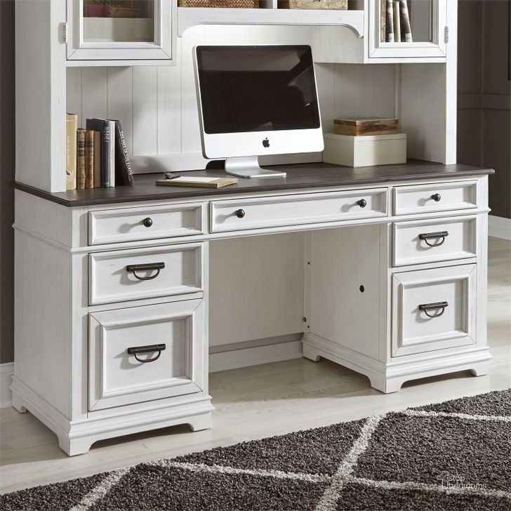 The appearance of Allyson Park Wirebrushed White Jr Executive Credenza designed by Liberty in the country / farmhouse interior design. This white piece of furniture  was selected by 1StopBedrooms from Allyson Park Collection to add a touch of cosiness and style into your home. Sku: 417-HO120T;417-HO120B. Product Type: Credenza. Image1