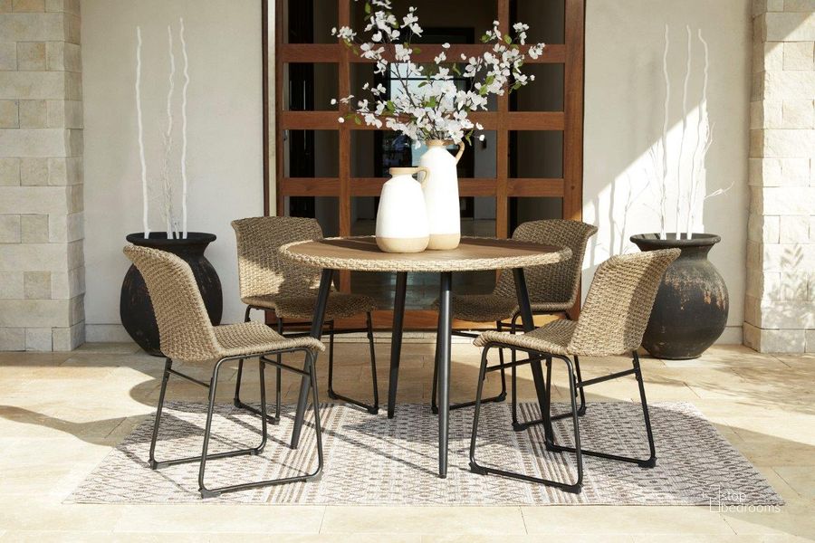 The appearance of Amaris Brown And Black Outdoor Dining Set designed by Signature Design by Ashley in the transitional interior design. This brown/black piece of furniture  was selected by 1StopBedrooms from Amaris Collection to add a touch of cosiness and style into your home. Sku: P369-615;P369-601. Table Top Shape: Round. Product Type: Outdoor Dining Set. Image1