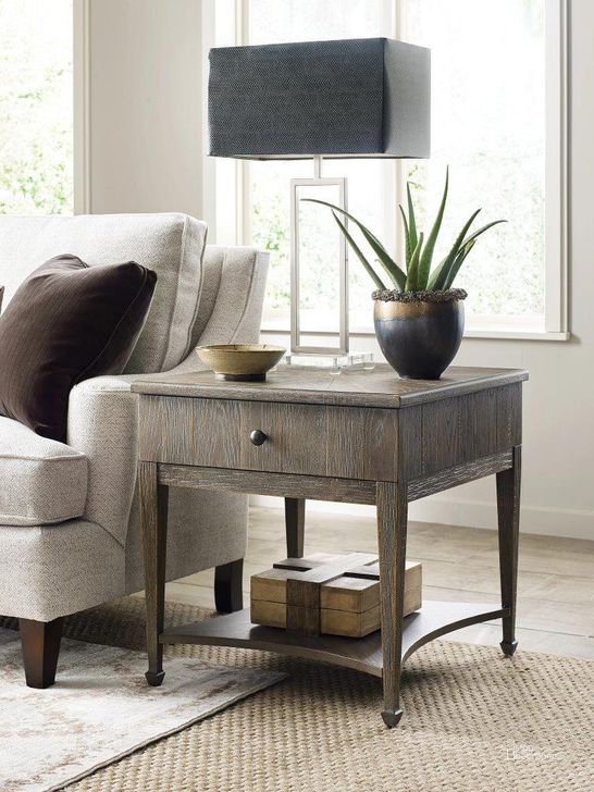 The appearance of American Drew Emporium Carmine Drawer End Table designed by American Drew in the transitional interior design. This dark stain piece of furniture  was selected by 1StopBedrooms from Emporium Collection to add a touch of cosiness and style into your home. Sku: 012-915. Material: Wood. Product Type: End Table. Image1
