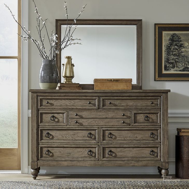The appearance of Americana Farmhouse 9 Drawer Dresser designed by Liberty in the traditional interior design. This taupe piece of furniture  was selected by 1StopBedrooms from Americana Farmhouse Collection to add a touch of cosiness and style into your home. Sku: 615-BR31. Product Type: Dresser. Material: Wood Veneer. Image1