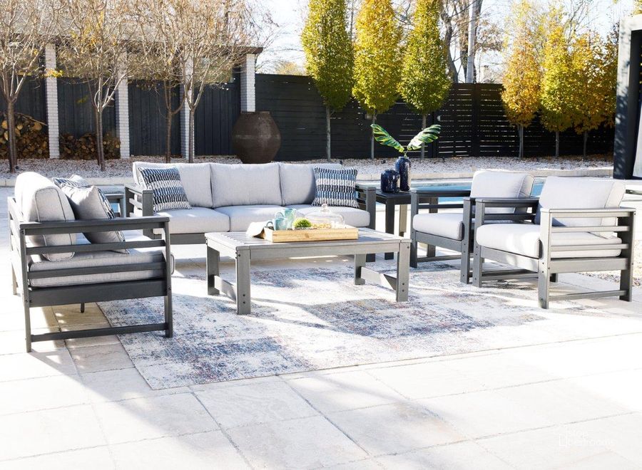 The appearance of Amora Charcoal Gray Outdoor Conversation Set designed by Signature Design by Ashley in the transitional interior design. This charcoal gray piece of furniture  was selected by 1StopBedrooms from Amora Collection to add a touch of cosiness and style into your home. Sku: P417-838;P417-835. Product Type: Outdoor Conversation Set. Image1
