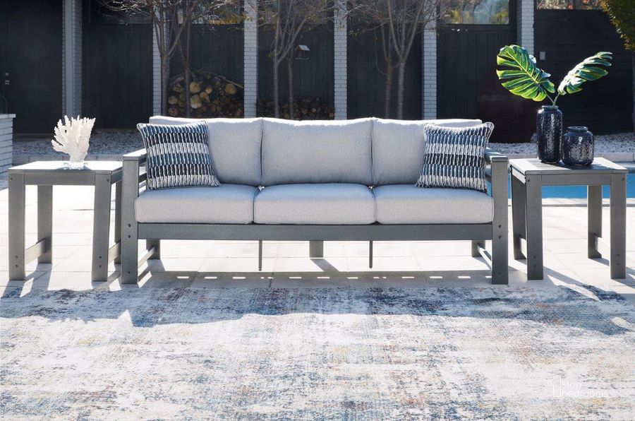 The appearance of Amora Charcoal Gray Outdoor Sofa designed by Signature Design by Ashley in the transitional interior design. This charcoal gray piece of furniture  was selected by 1StopBedrooms from Amora Collection to add a touch of cosiness and style into your home. Sku: P417-838. Product Type: Outdoor Sofa. Image1