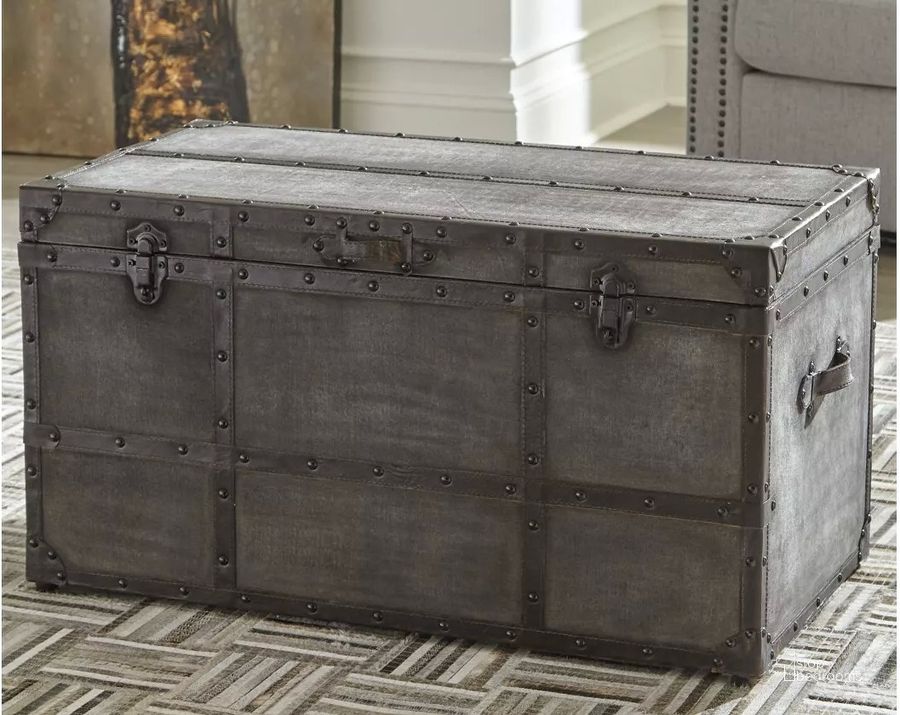 The appearance of Amsel Gray Storage Trunk designed by Signature Design by Ashley in the transitional interior design. This gray piece of furniture  was selected by 1StopBedrooms from Amsel Collection to add a touch of cosiness and style into your home. Sku: A4000092. Material: Metal. Product Type: Storage Trunk. Image1