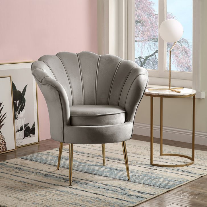 The appearance of Angelina Gray Velvet Scalloped Back Barrel Accent Chair With Metal Legs designed by Lilola Home in the modern / contemporary interior design. This gray piece of furniture  was selected by 1StopBedrooms from Angelina Collection to add a touch of cosiness and style into your home. Sku: 88880GY. Material: Metal. Product Type: Accent Chair. Image1