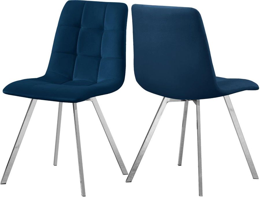 The appearance of Annie Navy Velvet Dining Chair Set of 2 designed by Meridian in the modern / contemporary interior design. This navy velvet piece of furniture  was selected by 1StopBedrooms from Annie Collection to add a touch of cosiness and style into your home. Sku: 980Navy-C. Product Type: Dining Chair. Material: Velvet. Image1