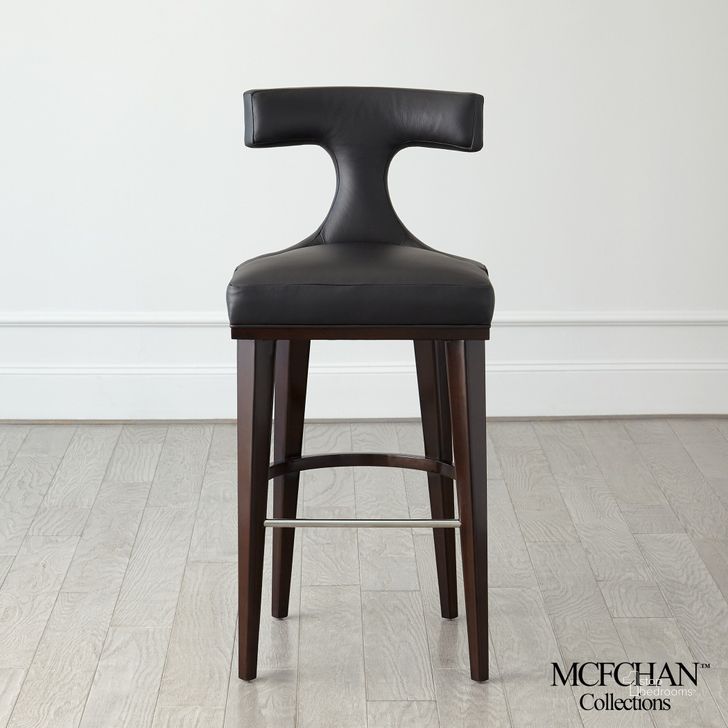 The appearance of Anvil Back Barstool In Black Leather designed by Global Views in the modern / contemporary interior design. This black piece of furniture  was selected by 1StopBedrooms from Anvil Collection to add a touch of cosiness and style into your home. Sku: MC-2519. Material: Wood. Product Type: Barstool. Image1
