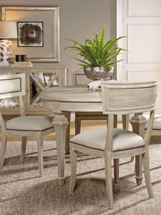 The appearance of Aperitif Bianco Round Dining Room Set designed by Artistica Home in the transitional interior design. This white piece of furniture  was selected by 1StopBedrooms from Aperitif Collection to add a touch of cosiness and style into your home. Sku: 01-2000-870-40;01-2000-880-40-01. Table Base Style: Legs. Table Top Shape: Round. Product Type: Dining Room Set. Size: 42". Image1