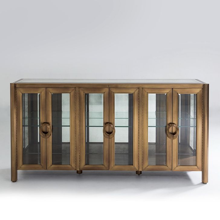 The appearance of Apothecary Console Cabinet In Bronze designed by Global Views in the modern / contemporary interior design. This bronze piece of furniture  was selected by 1StopBedrooms from Apothecary Collection to add a touch of cosiness and style into your home. Sku: 2576. Material: Glass. Product Type: Console. Image1