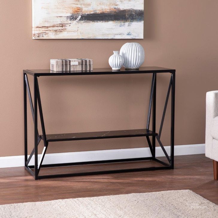 The appearance of Argall Long Glass Top Console Table designed by SEI Furniture in the modern / contemporary interior design. This black piece of furniture  was selected by 1StopBedrooms from Argall Collection to add a touch of cosiness and style into your home. Sku: CK1023903. Material: Wood. Product Type: Console Table. Image1