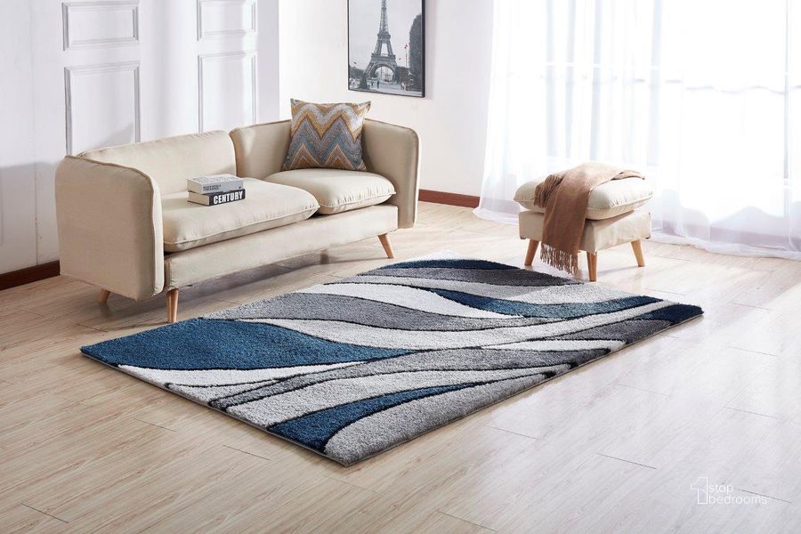 The appearance of Aria Collection Soft Pile Hand Tufted Shag Area Rug In Blue and Grey (2-Ft X 3-Ft) designed by Amazing Rugs in the modern / contemporary interior design. This blue piece of furniture  was selected by 1StopBedrooms from Aria Collection to add a touch of cosiness and style into your home. Sku: AC1013-23. Material: Polyester. Product Type: Area Rugs. Image1