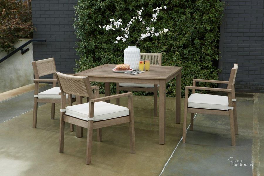 The appearance of Aria Plains Brown Outdoor Square Dining Room Set designed by Signature Design by Ashley in the transitional interior design. This brown piece of furniture  was selected by 1StopBedrooms from Aria Plains Collection to add a touch of cosiness and style into your home. Sku: P359-615;P359-601A. Table Top Shape: Square. Material: Wood. Product Type: Outdoor Dining Set. Image1