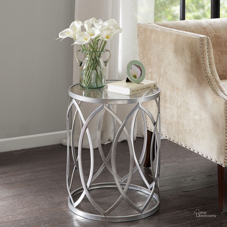 The appearance of Arlo Metal Eyelet Accent Table In Grey designed by Olliix in the transitional interior design. This grey piece of furniture  was selected by 1StopBedrooms from Arlo Collection to add a touch of cosiness and style into your home. Sku: FPF17-0295. Material: Metal. Product Type: Accent Table. Image1