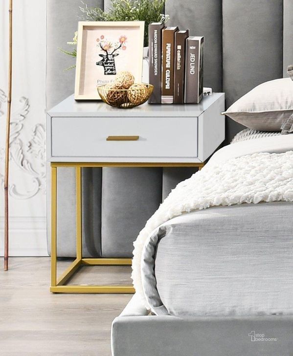 The appearance of Arlo Single Drawer Night Stand In White and Gold designed by US Tamex in the modern / contemporary interior design. This white and gold piece of furniture  was selected by 1StopBedrooms from Arlo Collection to add a touch of cosiness and style into your home. Sku: 4326314. Material: Wood. Product Type: Nightstand. Image1