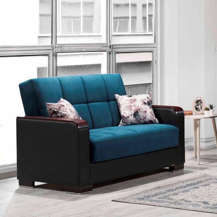 The appearance of Armada X Upholstered Convertible Wood Trimmed Loveseat with Storage In Blue ARM-W-LS-317 designed by Casamode in the modern / contemporary interior design. This blue piece of furniture  was selected by 1StopBedrooms from Armada X Collection to add a touch of cosiness and style into your home. Sku: ARM-W-LS-317. Material: Leather. Product Type: Loveseat. Image1