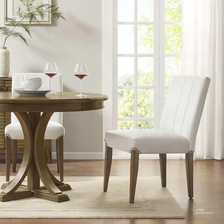 The appearance of Audrey Dining Chair Set Of 2 In Cream designed by Olliix in the transitional interior design. This cream piece of furniture  was selected by 1StopBedrooms from Audrey Collection to add a touch of cosiness and style into your home. Sku: MP108-1139. Material: Wood. Product Type: Dining Chair. Image1