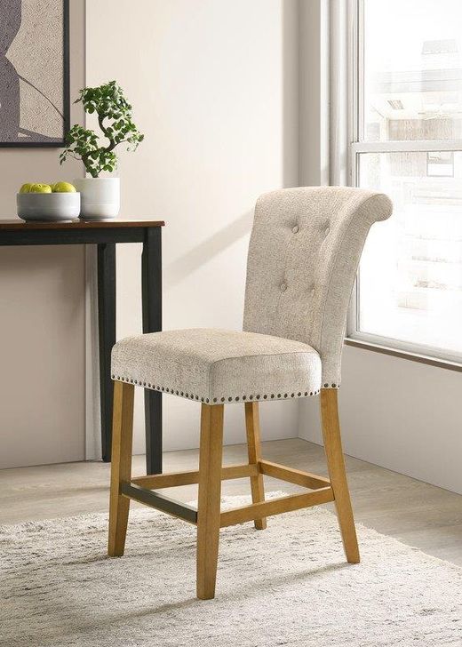 The appearance of Auggie Cream Fabric Counter Height Chair With Nailhead Trim designed by Lilola Home in the modern / contemporary interior design. This cream piece of furniture  was selected by 1StopBedrooms from Auggie Collection to add a touch of cosiness and style into your home. Sku: 30515. Material: Fabric. Product Type: Counter Height Chair. Image1