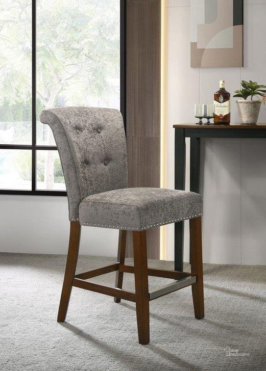 The appearance of Auggie Gray Fabric Counter Height Chair With Nailhead Trim designed by Lilola Home in the modern / contemporary interior design. This gray piece of furniture  was selected by 1StopBedrooms from Auggie Collection to add a touch of cosiness and style into your home. Sku: 30516. Material: Fabric. Product Type: Counter Height Chair. Image1