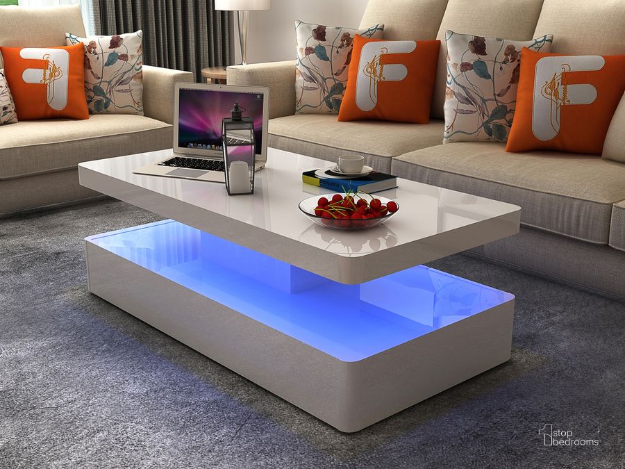 The appearance of Aurora Modern and Contemporary Style Bult In Led Coffee Table Made With Wood and Glossy Finish designed by Galaxy Home Furnishings in the modern / contemporary interior design. This white piece of furniture  was selected by 1StopBedrooms from Aurora Collection to add a touch of cosiness and style into your home. Sku: 601955552592. Material: Wood. Product Type: Coffee Table. Image1