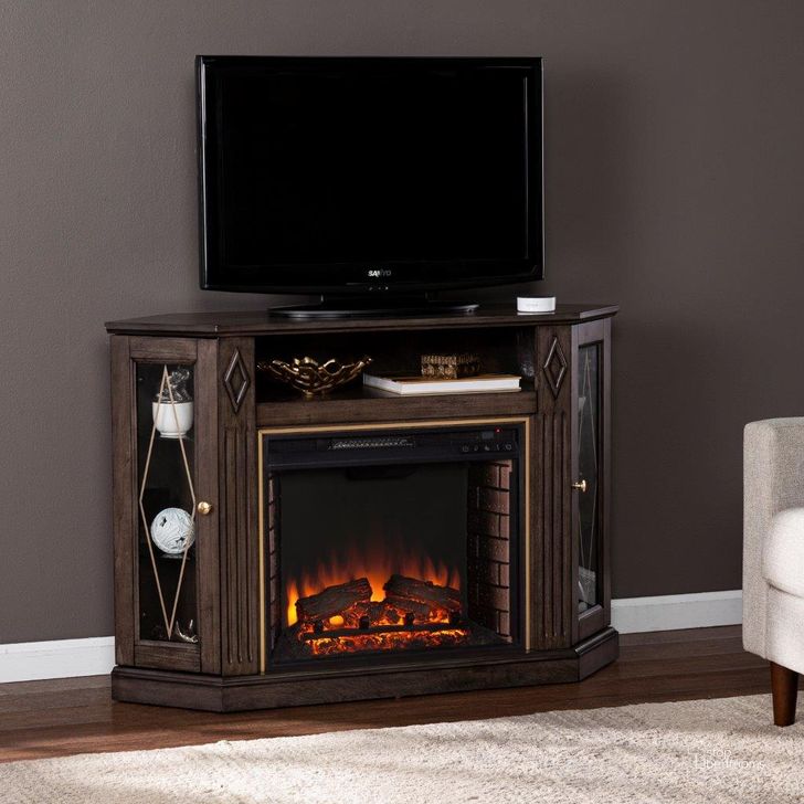 The appearance of Austindale Electric Fireplace With Media Storage designed by SEI Furniture in the transitional interior design. This light brown piece of furniture  was selected by 1StopBedrooms from Austindale Collection to add a touch of cosiness and style into your home. Sku: FE1137556. Material: Wood. Product Type: Fireplace. Image1