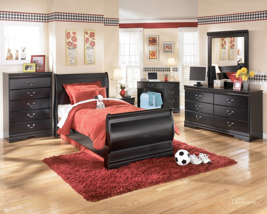 The appearance of Huey Vineyard Youth Bedroom Set designed by Signature Design by Ashley in the transitional interior design. This black piece of furniture  was selected by 1StopBedrooms from Huey Vineyard Collection to add a touch of cosiness and style into your home. Sku: B128-63;B128-62;B128-82;B128-92. Bed Type: Sleigh Bed. Material: Wood. Product Type: Sleigh Bed. Bed Size: Twin. Image1