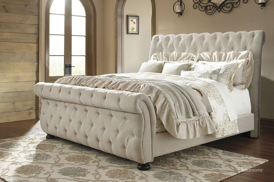 The appearance of Willenburg Linen Cal. King Upholstered Sleigh Bed designed by Signature Design by Ashley in the transitional interior design. This linen piece of furniture  was selected by 1StopBedrooms from Willenburg Collection to add a touch of cosiness and style into your home. Sku: B643-78;B643-76;B643-95. Bed Type: Sleigh Bed. Material: Fabric. Product Type: Sleigh Bed. Bed Size: California King. Image1
