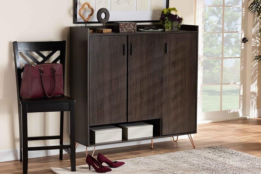 The appearance of Baldor Modern and Contemporary Dark Brown Finished Wood 3-Door Shoe Cabinet designed by Baxton Studio in the modern / contemporary interior design. This dark brown piece of furniture  was selected by 1StopBedrooms from Baldor Collection to add a touch of cosiness and style into your home. Sku: MPC8022-Dark Brown-Shoe Cabinet. Product Type: Cabinet. Material: MDF. Image1
