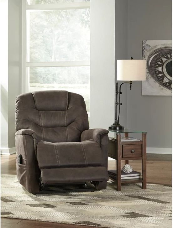The appearance of Ballister Espresso Power Lift Recliner designed by Signature Design by Ashley in the modern / contemporary interior design. This espresso piece of furniture  was selected by 1StopBedrooms from Ballister Collection to add a touch of cosiness and style into your home. Sku: 2160412. Material: Fabric. Product Type: Recliner. Image1