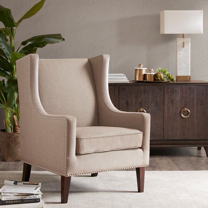 The appearance of Barton Wing Chair In Taupe designed by Olliix in the modern / contemporary interior design. This taupe piece of furniture  was selected by 1StopBedrooms from Barton Collection to add a touch of cosiness and style into your home. Sku: FPF18-0152. Material: Wood. Product Type: Accent Chair. Image1