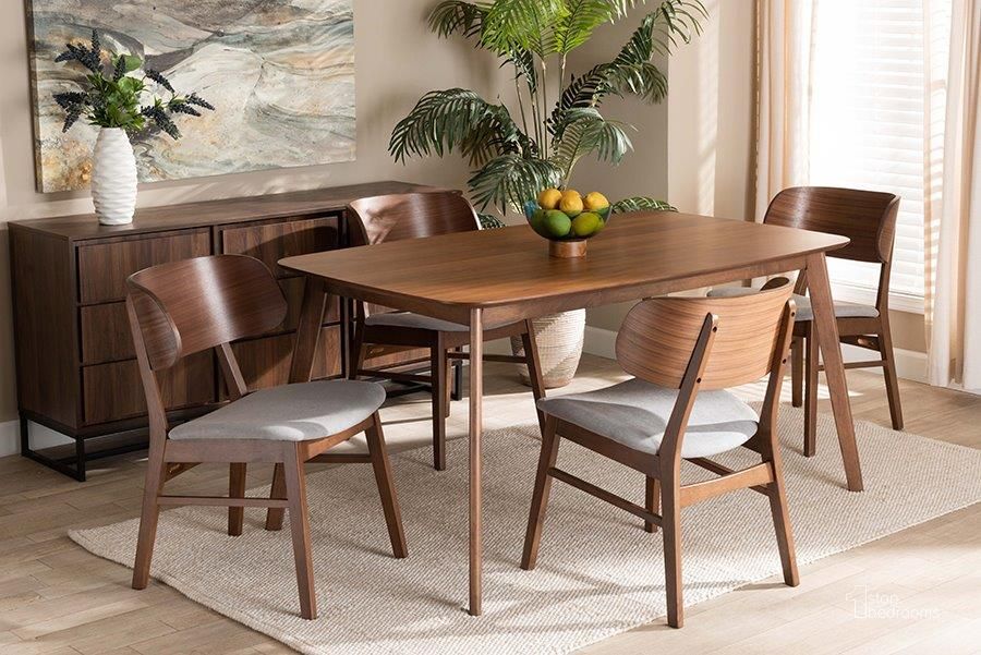 The appearance of Baxton Studio Alston Mid-Century Modern Grey Fabric Upholstered and Walnut Brown Finished Wood 5-Piece Dining Set designed by Baxton Studio in the transitional interior design. This walnut and grey piece of furniture  was selected by 1StopBedrooms from Alston Collection to add a touch of cosiness and style into your home. Sku: WM1892B-Smoke/Walnut-5PC Dining Set. Product Type: Dining Room Set. Material: Rubberwood. Image1