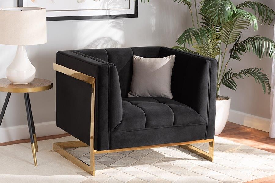 The appearance of Baxton Studio Ambra Glam and Luxe Black Velvet Fabric Upholstered and Button Tufted Armchair with Gold-Tone Frame designed by Baxton Studio in the glam interior design. This black and gold piece of furniture  was selected by 1StopBedrooms from Ambra Collection to add a touch of cosiness and style into your home. Sku: TSF-5507-Black/Gold-CC. Product Type: Arm Chair. Material: Stainless Steel. Image1
