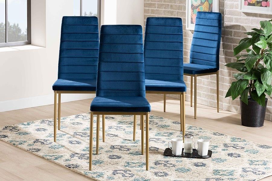 The appearance of Baxton Studio Armand Modern Glam and Luxe Navy Blue Velvet Fabric Upholstered and Gold Finished Metal 4-Piece Dining Chair Set designed by Baxton Studio in the glam interior design. This blue and gold piece of furniture  was selected by 1StopBedrooms from Armand Collection to add a touch of cosiness and style into your home. Sku: 112157-1-Navy Blue Velvet/Gold-DC. Product Type: Dining Chair. Material: Plywood. Image1