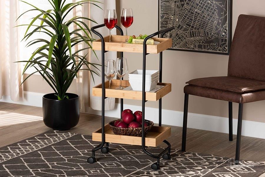 The appearance of Baxton Studio Baxter Modern And Contemporary Oak Brown Finished Wood And Black Metal 3-Tier Mobile Kitchen Cart designed by Baxton Studio in the modern / contemporary interior design. This oak brown piece of furniture  was selected by 1StopBedrooms from Baxter Collection to add a touch of cosiness and style into your home. Sku: NL2020822-Kitchen Cart. Material: Metal. Product Type: Kitchen Cart. Image1