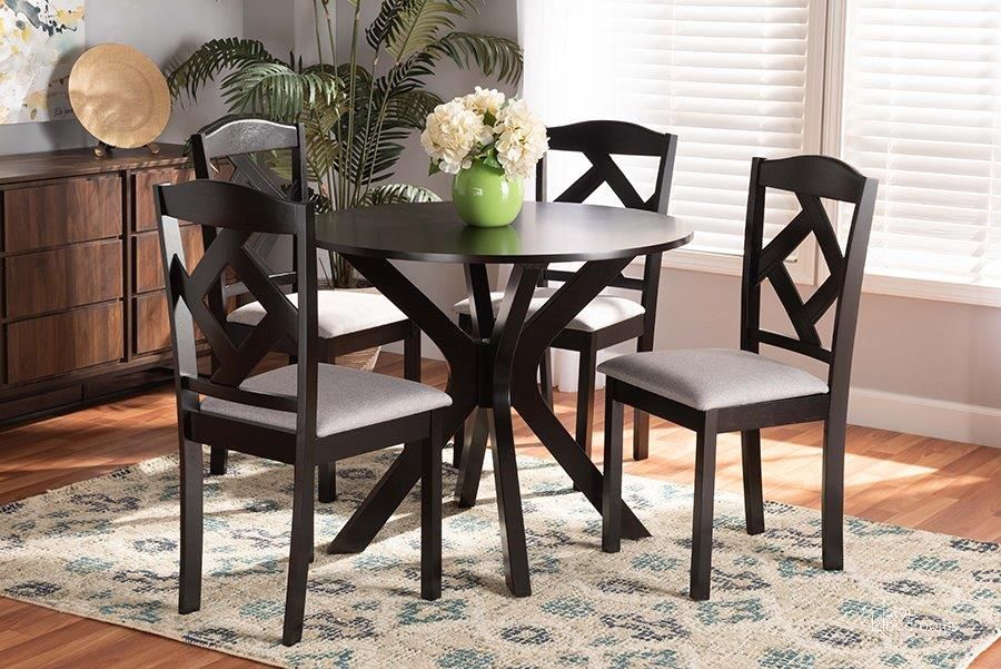 The appearance of Baxton Studio Carlin Modern Transitional Grey Fabric Upholstered and Dark Brown Finished Wood 5-Piece Dining Set designed by Baxton Studio in the transitional interior design. This dark brown piece of furniture  was selected by 1StopBedrooms from Carlin Collection to add a touch of cosiness and style into your home. Sku: Carlin-Grey/Dark Brown-5PC Dining Set. Product Type: Dining Room Set. Material: MDF. Image1