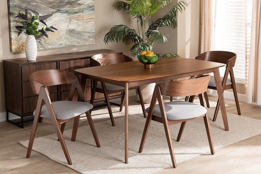 The appearance of Baxton Studio Danton Mid-Century Modern Grey Fabric Upholstered and Walnut Brown Finished Wood 5-Piece Dining Set designed by Baxton Studio in the transitional interior design. This walnut and grey piece of furniture  was selected by 1StopBedrooms from Danton Collection to add a touch of cosiness and style into your home. Sku: WM1900B-Smoke/Walnut-5PC Dining Set. Product Type: Dining Room Set. Material: Rubberwood. Image1