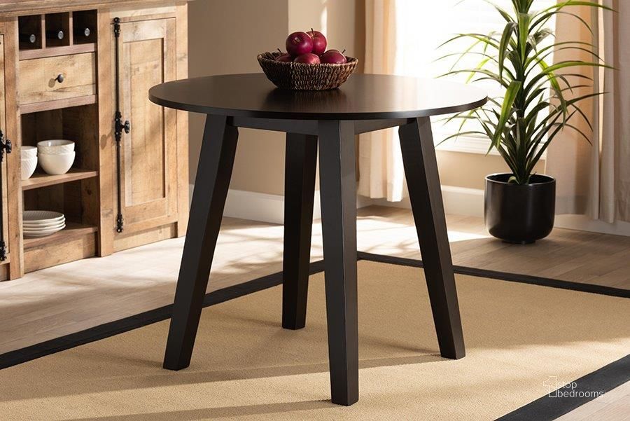 The appearance of Baxton Studio Ela Modern and Contemporary Dark Brown Finished 35-Inch-Wide Round Wood Dining Table designed by Baxton Studio in the modern / contemporary interior design. This dark brown piece of furniture  was selected by 1StopBedrooms from Ela Collection to add a touch of cosiness and style into your home. Sku: RH7230T-Dark Brown-35-IN-DT. Table Base Style: Pedestal. Table Top Shape: Round. Product Type: Dining Table. Material: MDF. Size: 35". Image1