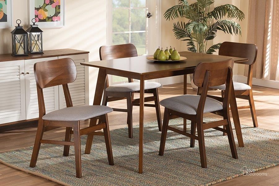 The appearance of Baxton Studio Euclid Mid-Century Modern Grey Fabric Upholstered and Walnut Brown Finished Wood 5-Piece Dining Set designed by Baxton Studio in the transitional interior design. This walnut brown piece of furniture  was selected by 1StopBedrooms from Euclid Collection to add a touch of cosiness and style into your home. Sku: RH369C-Grey/Walnut-5PC Dining Set. Product Type: Dining Room Set. Material: Rubberwood. Image1