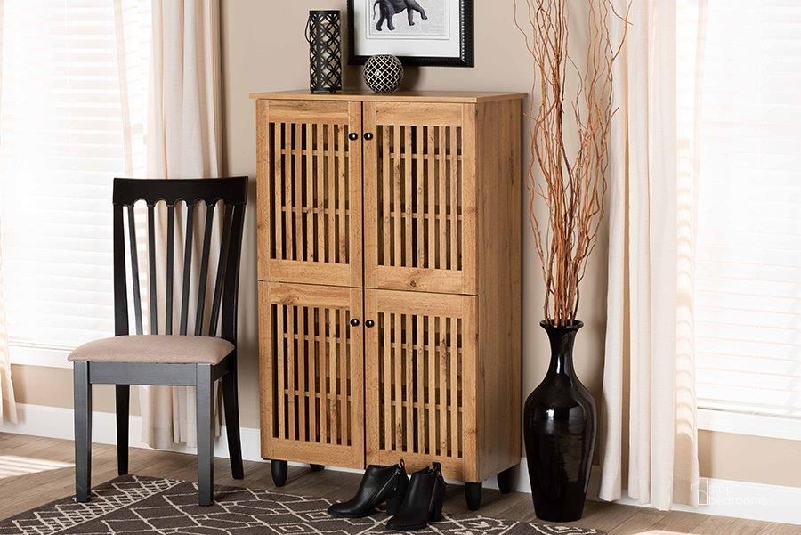 The appearance of Baxton Studio Fernanda Modern and Contemporary Oak Brown Finished Wood 4-Door Shoe Storage Cabinet designed by Baxton Studio in the modern / contemporary interior design. This oak brown piece of furniture  was selected by 1StopBedrooms from Fernanda Collection to add a touch of cosiness and style into your home. Sku: SC864574 A-Wotan Oak. Product Type: Storage Cabinet. Material: MDF. Image1