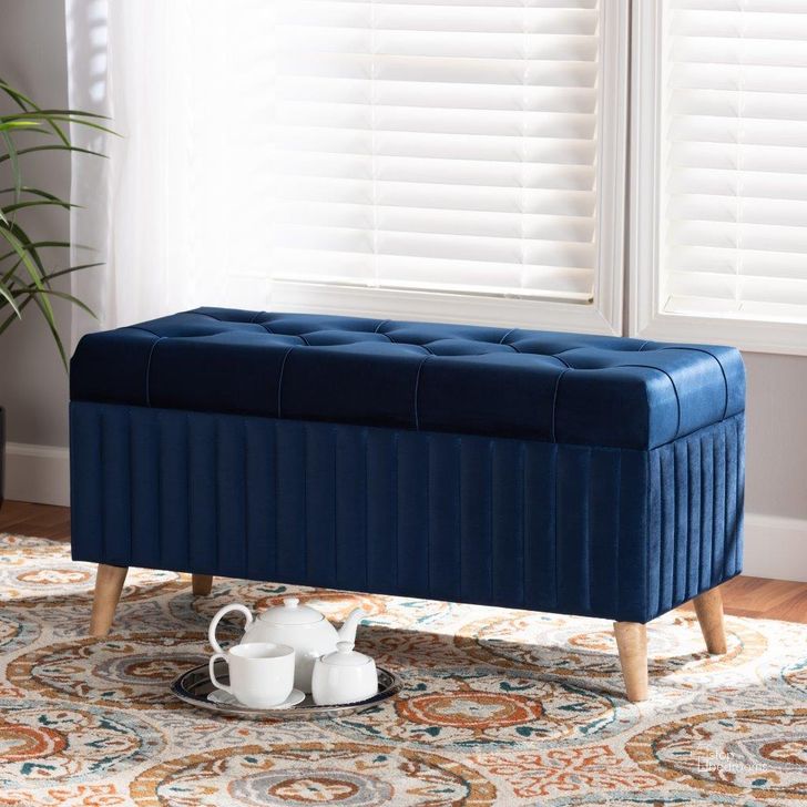 The appearance of Baxton Studio Hanley Modern and Contemporary Navy Blue Velvet Fabric Upholstered and Walnut Brown Finished Wood Storage Ottoman designed by Baxton Studio in the modern / contemporary interior design. This navy blue piece of furniture  was selected by 1StopBedrooms from Hanley Collection to add a touch of cosiness and style into your home. Sku: HY2A19B046S-Navy Blue Velvet-Otto. Material: Fabric. Product Type: Ottoman. Image1